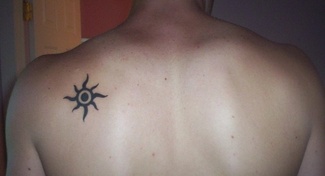Small Tribal Sun Tattoo Design Picture