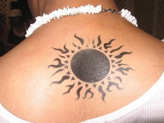 Tribal Sun Tattoo Design on Upper Back Picture
