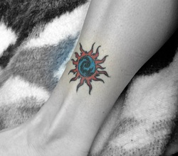 Sun Tattoo Design for Leg Picture