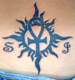Tribal Sun Tattoo Design with Cross Picture