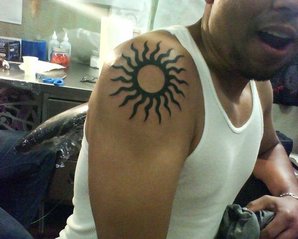 Tribal Sun Tattoo Design Picture