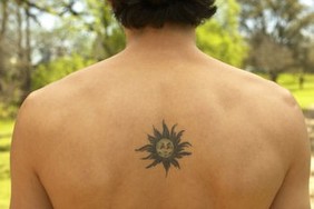 Sun Tattoo Design for Back Picture