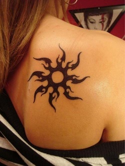 Black Tribal Sun Tattoo Design Picture