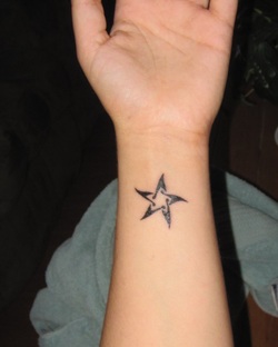 Black Star Tattoo Design Picture