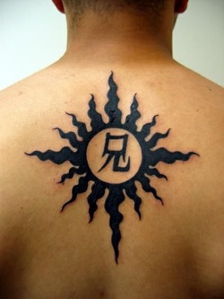 Tribal Sun Tattoo Design on Back Picture