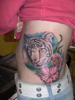 Tiger with Flowers Tattoo Design Picture