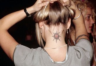 Tribal Sun Tattoo Design on Neck Picture