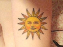 Yellow Sun Tattoo Design Picture